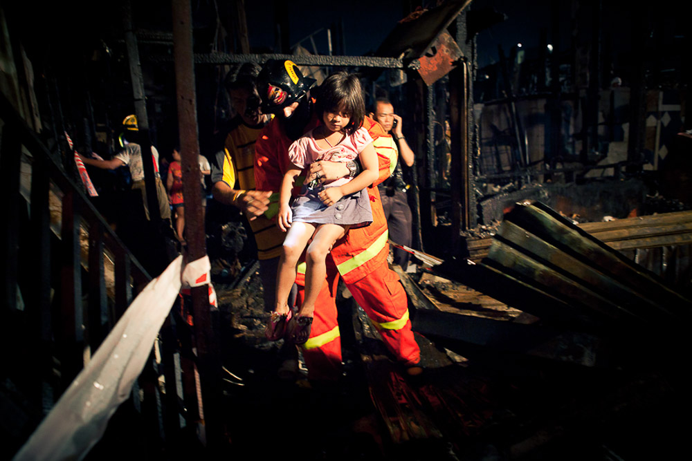 Photo Essay: Picking up the pieces after Khlong Toey slum fire