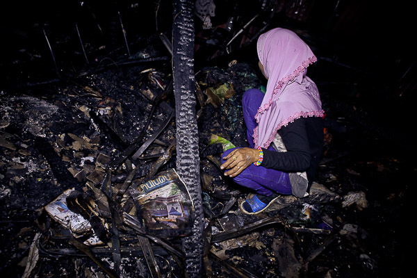 Photo Essay: Picking up the pieces after Khlong Toey slum fire