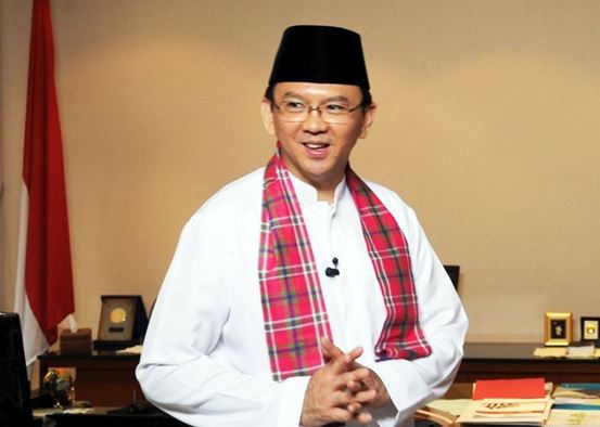 Former Jakarta Governor Basuki “Ahok” Tjahaja Purnama wearing Islamic clothing.
