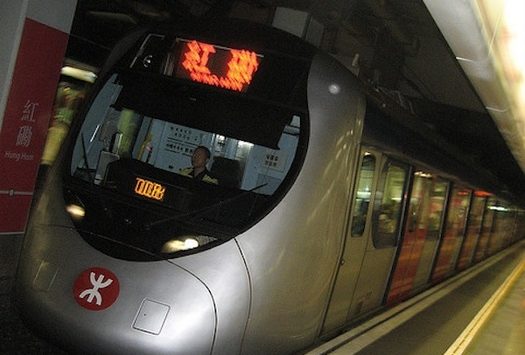 An MTR train passes through Hung Hom station.