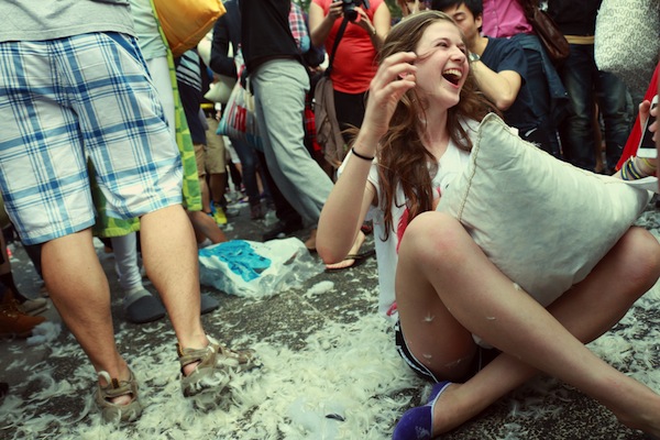 laughing with pillow