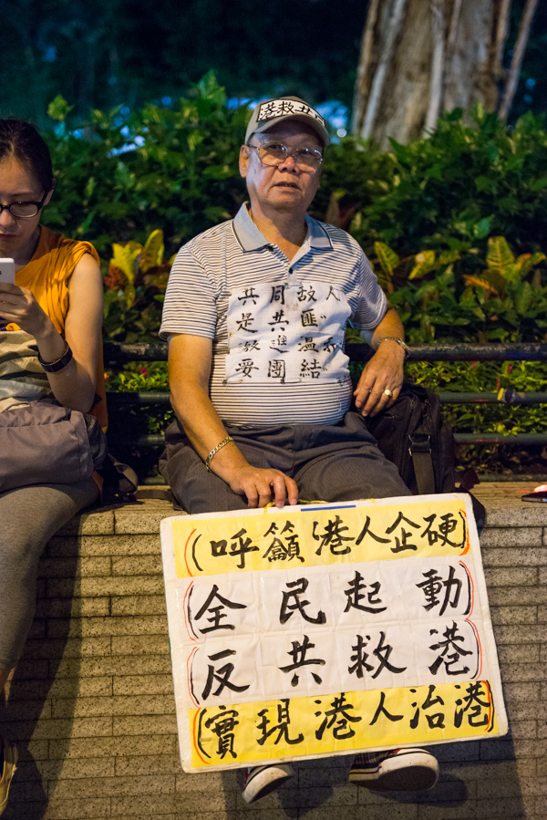 Occupy Central Hong Kong man with Chinese sign 