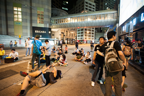 Occupy Central Hong Kong protesters sitting 