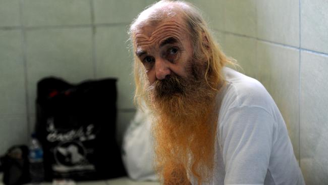Robert Andrew Fiddes Ellis of Australia sits in a holding cell at the prosecutor’s office in Denpasar on Bali island on May 2, 2016. Ellis was sentenced to 15 years in prison for molesting Indonesian children in Bali. Photo: Sonny Tumbelaka/AFP