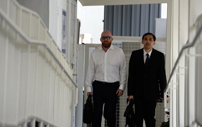Swiss banker Jens Fred Sturzenegger arrives at the state court in Singapore on January 11, 2017. Photo: Roslan Rahman / AFP