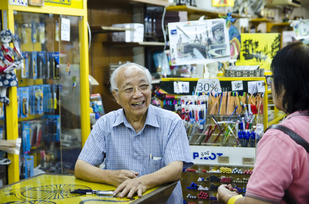 Mr Yap with a customer