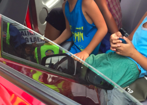 The three kids were playing with gadgets when the authorities rescued them. PHOTO: ABS-CBN News