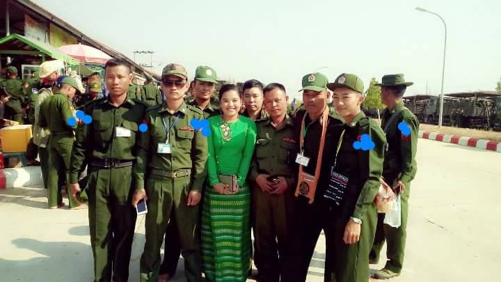 Sandi Myint Aung poses with soldiers. Photo: Facebook / Sandi Myint Aung