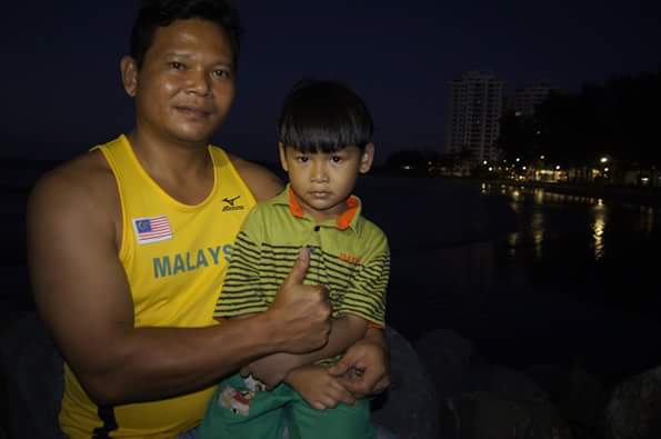 Watson Nyambek and son via Facebook