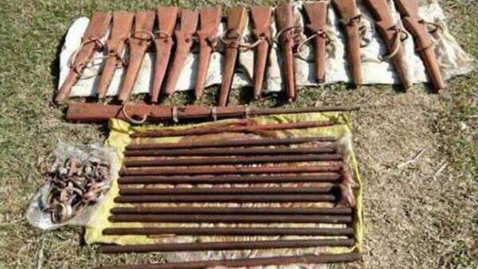Several guns and wooden sticks that the insurgents reportedly use for practice were also found in the tunnels. Photo: Facebook / State Counsellor Office Information Committee