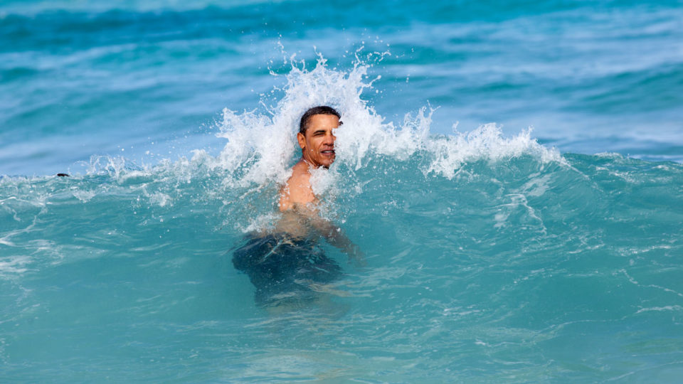 United States President Barack Obama swimming at Pyramid Rock Beach in Kaneohe Bay on New Year’s Day, 2012, during his annual Christmas holiday with family and friends. PHOTO: Official White House image via Wikimedia Commons