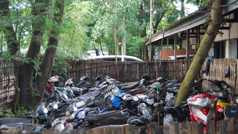 Confiscated motorbikes at the North Okkalapa police station. Photo: Jacob Goldberg