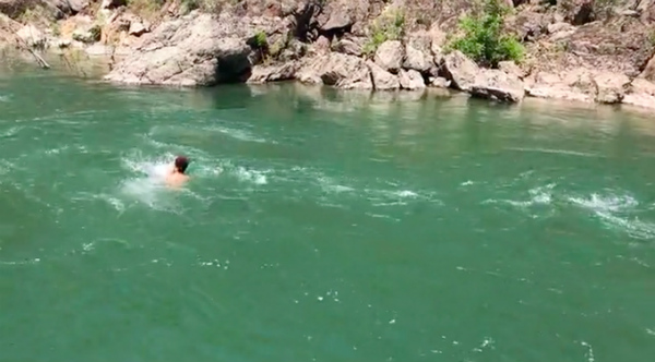 Ray Cabalfin was filmed as he struggled to get out of the river. PHOTO: Screen grab from Vimeo