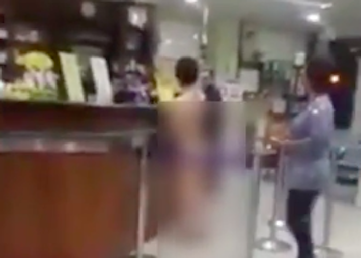 Video screengrab of VM shopping in the buff at a  pharmacy in West Jakarta.