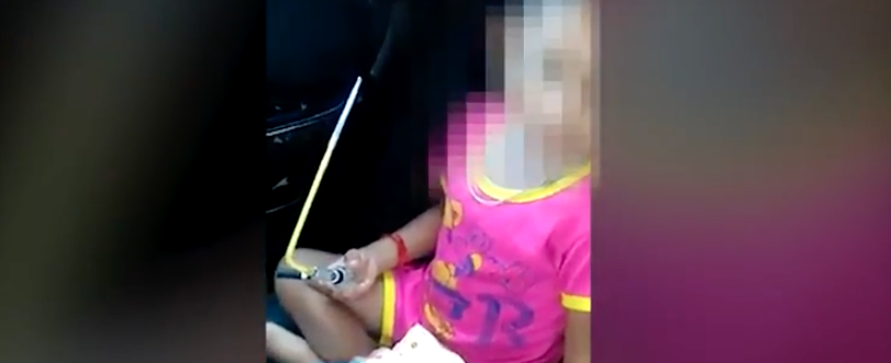 Clip from video of boy holding pipe