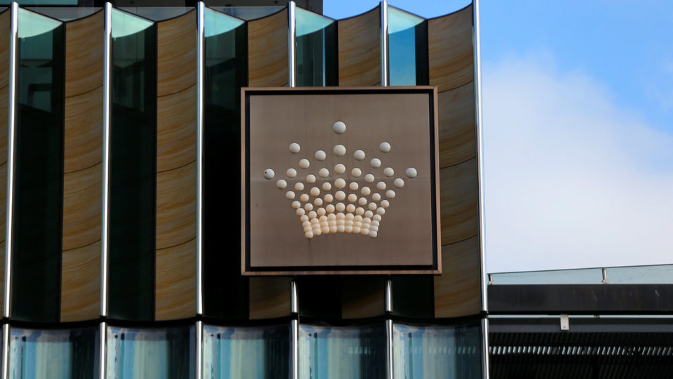 The logo of Australian casino giant Crown Resorts Ltd adorns the hotel and casino complex in Melbourne.       REUTERS/Jason Reed