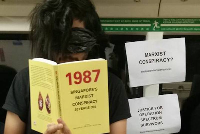 A silent protest on an MRT train organized by Wham in June. Photo: Jolovan Wham / Facebook