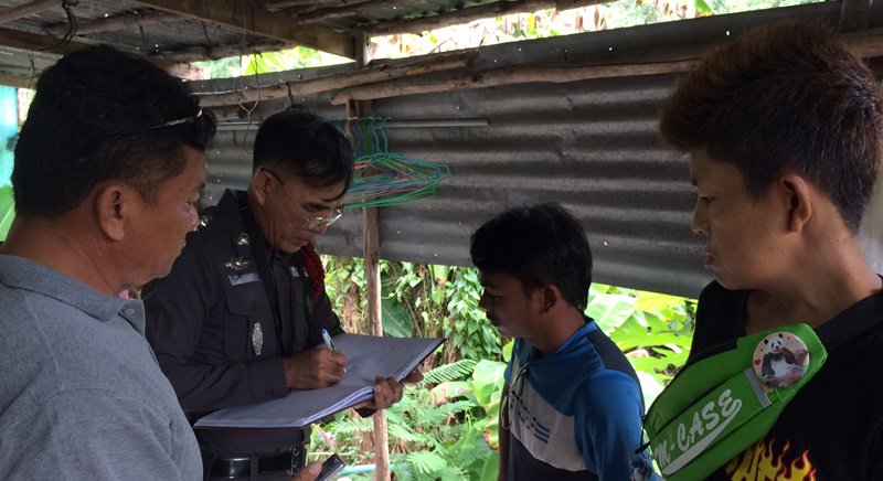 Witnesses outside the scene. Photo: The Phuket News