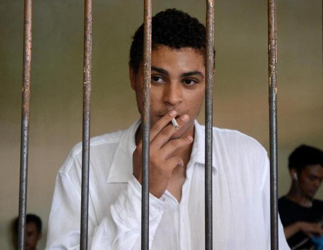 American man Tommy Schaefer waits inside a holding cell at a court in Denpasar, Bali on March 31, 2015. Photo: Sonny Tumbelaka/AFP