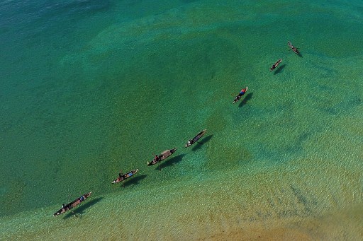 A row of Moken fishing boats in the Myeik Archipelago. PHOTO: AFP / Ye Aung Thu