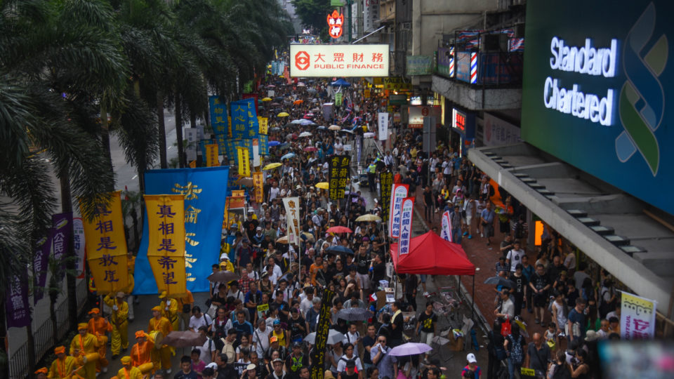 Hongkongers walk through Wan Chai during the annual democracy march, July 1, 2017. Photo: Jonathon Morton/Coconuts Media