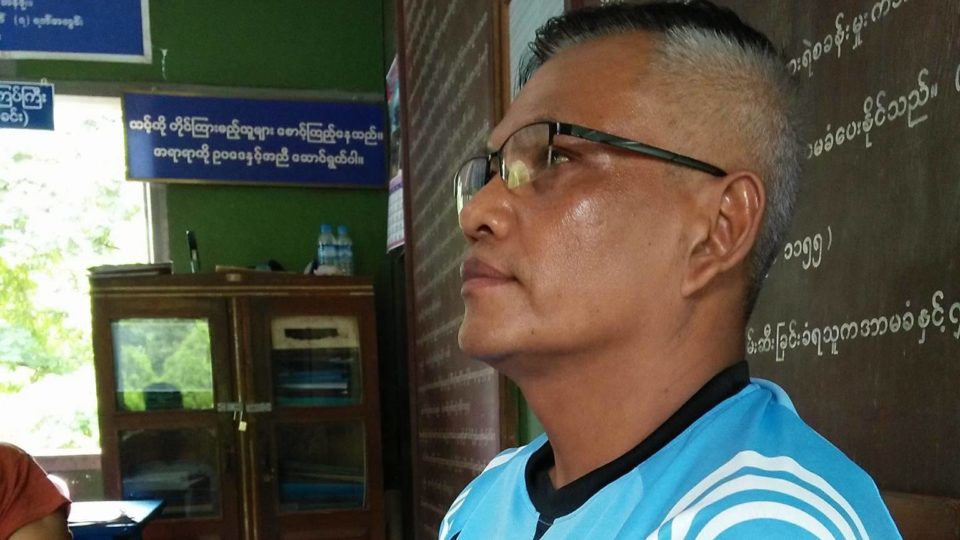 Ko Min Htay awaits a court hearing at the Banmaw police station on July 10, 2017.