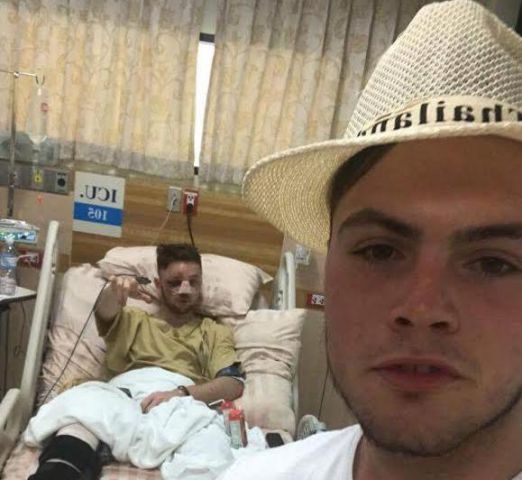 Brit backpacker Luke Scott and his friend, Harvey Hughes, in the hospital recovering. All photos: Courtesy of the Scott family. 