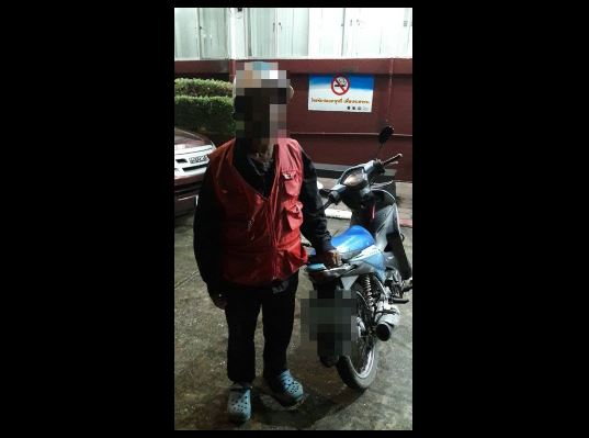 The suspect as he was picked up. Photo: The Phuket News