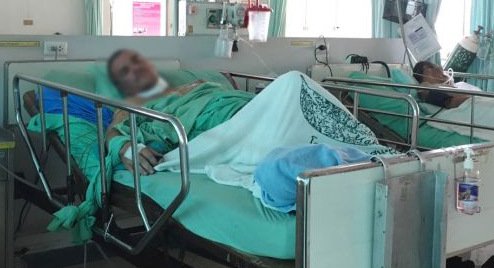 Papke was charged in his hospital bed. Photos: The Phuket News