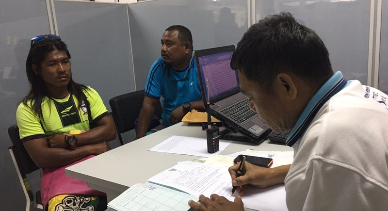 Police question the parasail operators. Photo: Karon Police
