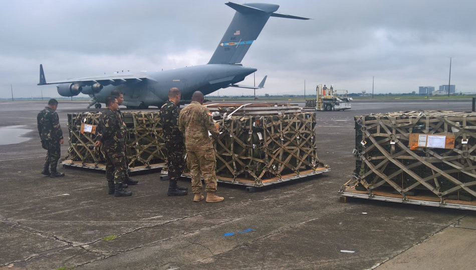Members of both the US and Philippine armies unload and inspect a delivery of 992 2.75 inch rockets from the U.S. to the Armed Forces of the Philippines (AFP) at Clark Air Base, Pampanga. This delivery is one of many recent deliveries from the U.S. through the Mutual Logistics Support Agreement (MLSA) that enhance the AFP’s counterterrorism capabilities and directly support AFP members engaged in current counterterrorism operations. Photo courtesy of US Embassy Manila