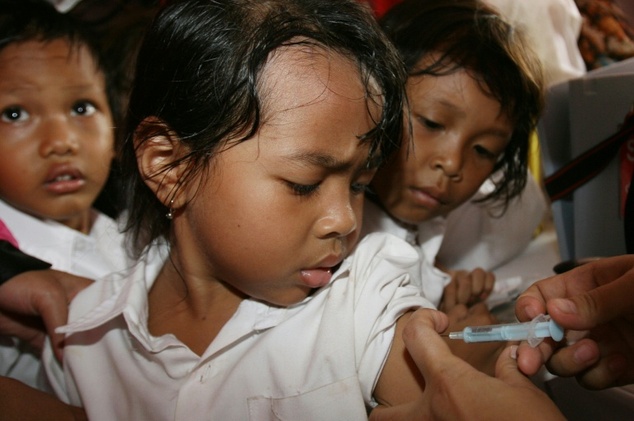 Child in Indonesia receiving an immunization vaccine. Photo: AFP