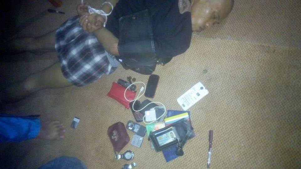 After kicking him upside the head, and rendering him unconscious, the man’s wife uploaded his pictures and loot to Facebook / via Nabila Nabila