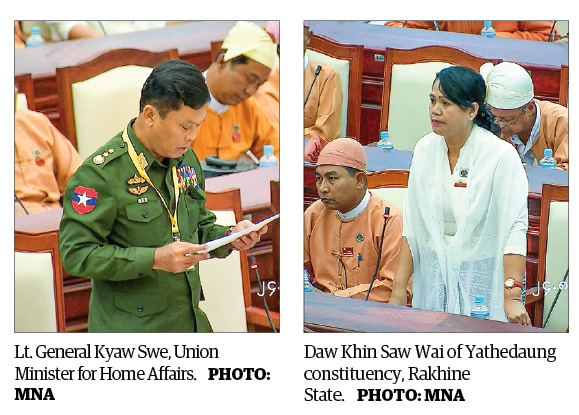 MP Khin Saw Wai (R) and Union Minister for Home Affairs Lt. General Kyaw Swe appear in parliament on August 24, 2017. Photo: MOI