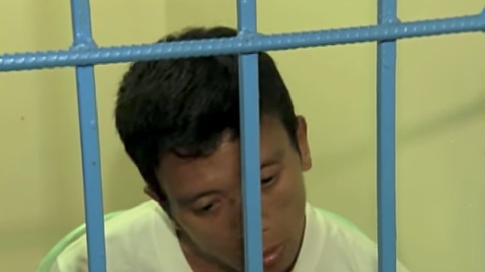 Roderick Balilla behind bars after driving away with his passenger’s phone. PHOTO: Screengrab from ABS-CBN News footage
