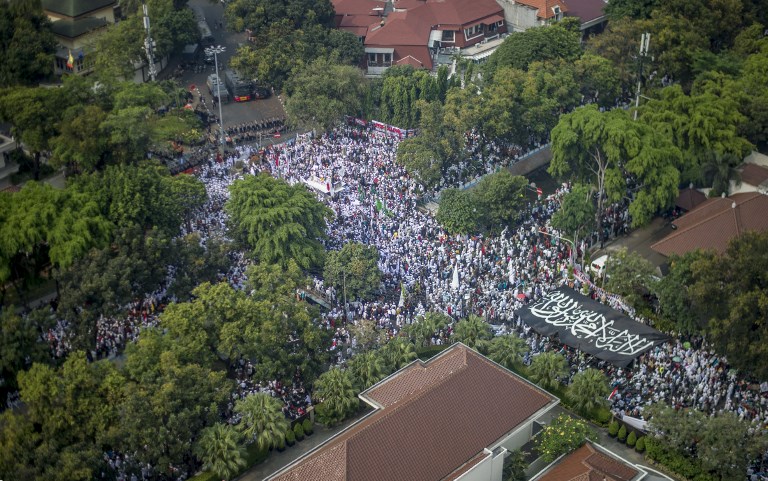 Demonstrators take part in an anti-Myanmar rally nearby its embassy in Jakarta on September 6, 2017.

Indonesian Muslims protested outside the Myanmar embassy in Jakarta on September 6 demanding an end to violence against the countrys Rohingya Muslim minority. / AFP PHOTO / BAY ISMOYO