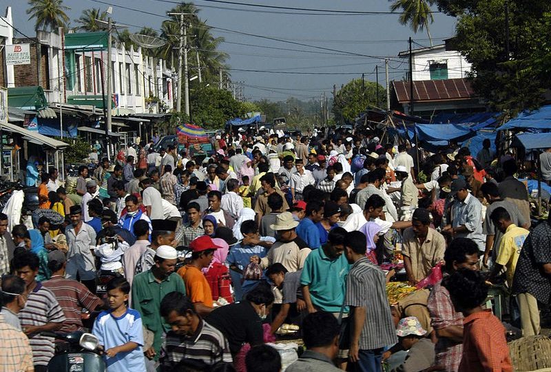A busy crowd at a market place near Banda Aceh, Sumatra, Indonesia. Photo: Wikimedia Commons