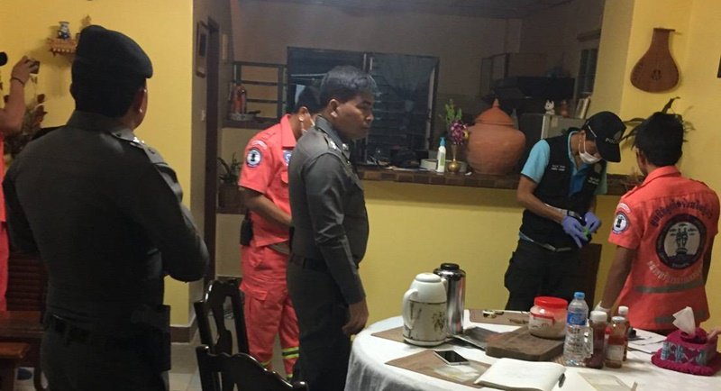 Police inspect the couple’s home. Photo: The Phuket News