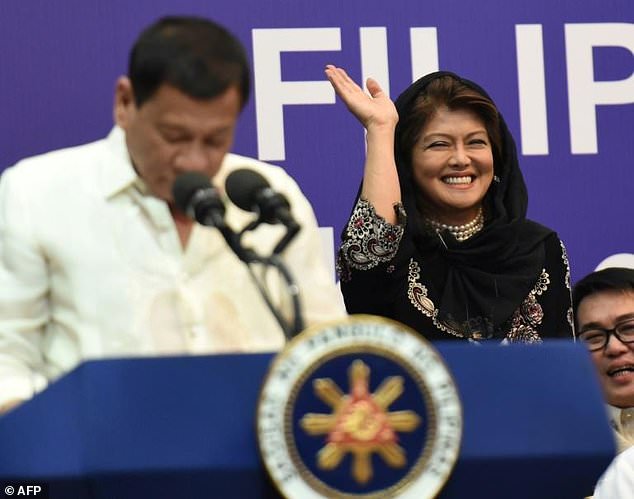 Imee Marcos (R), daughter of dictator Ferdinand Marcos (with Philippine President Rodrigo Duterte) has defended the legacy of her late father whose rule was marked by allegations of massive corruption and rampant human rights violations. AFP