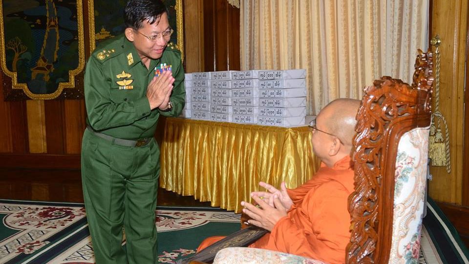 Myanmar commander-in-chief Senior General Min Aung Hlaing greets a Buddhist monk. Photo: Facebook / Senior General Min Aung Hlaing