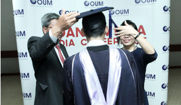 “Jim” receiving his MBA