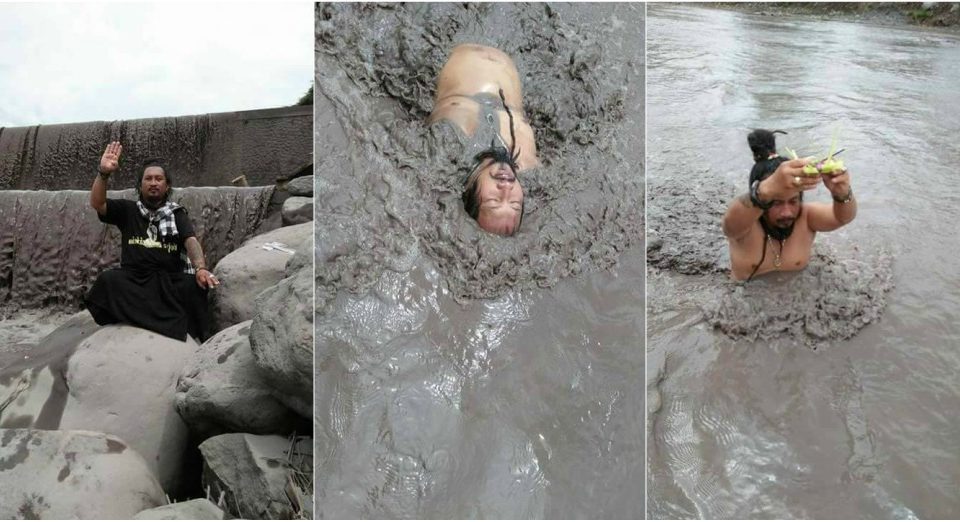 “Jero Kuncir Gimbal” does a Balinese cleansing ceremony in a lahar. Photos via Facebook