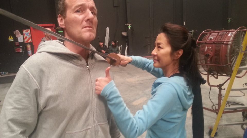 Bey Logan with Michelle Yeoh on the set of Crouching Tiger, Hidden Dragon: The Sword of Destiny. Photo via Facebook.