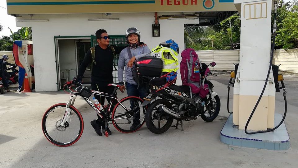 Zairi with his support crew