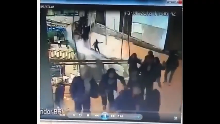 Video screengrab taken from CCTV footage showing the moment a walkway collapses in Jakarta’s stock exchange complex on January 15, 2017.