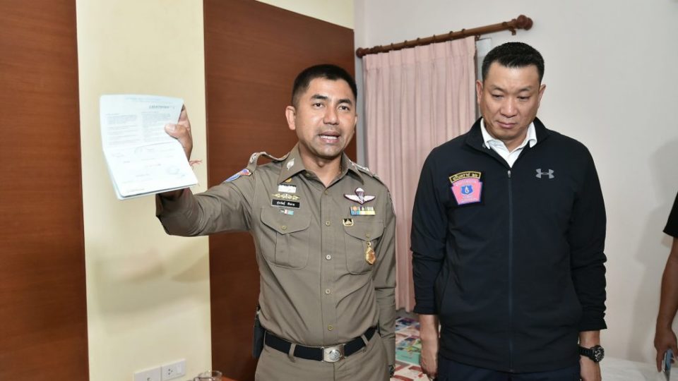 Tourist Police Bureau deputy commissioner Pol. Maj. Gen. Surachet Hakparn (left) is photographed at a recent raid in Huai Khwang area. Photo: Tourist Police 