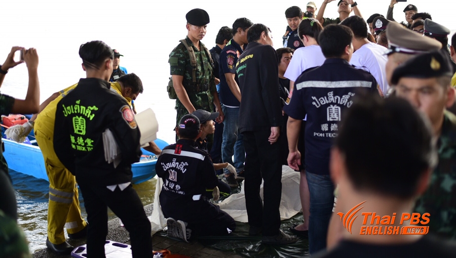 Divers on the scene at the river. Photo: Thai PBS.