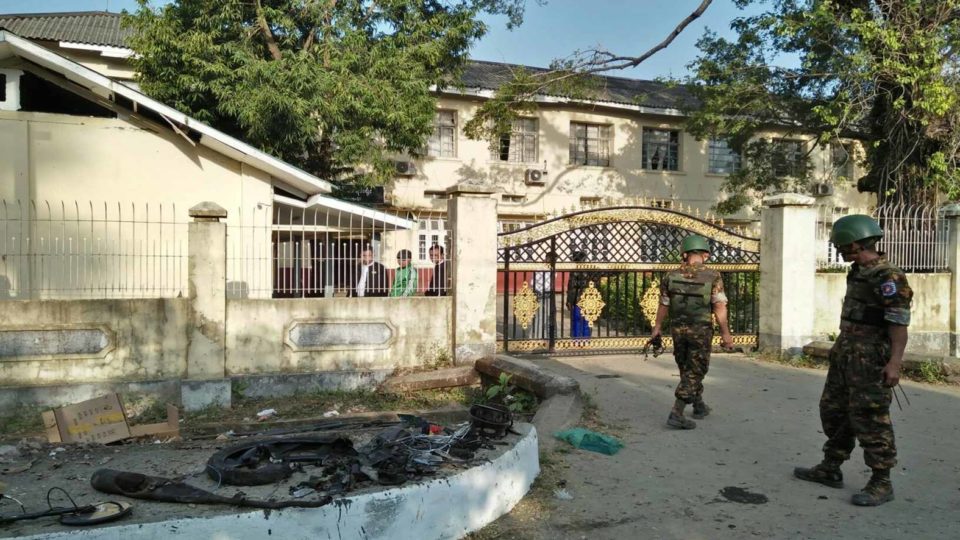 Myanmar security personnel inspect the aftermath of one of three bombings in Sittwe on Feb. 24, 2018. Photo: Office of the Commander-in-Chief
