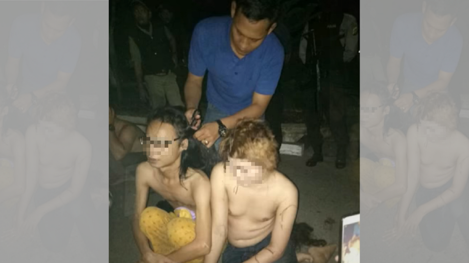 Last week’s incident in Bekasi echoed another incident from January of this year, pictured above, in which several transwomen in North Aceh had their heads forcefully shaved by Sharia police officers. Photo: North Aceh Police