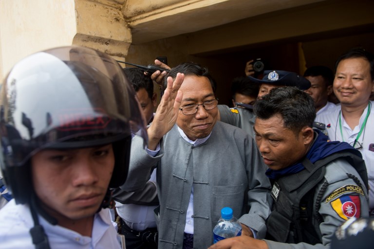 Aye Maung (C), former (ANP) Arakan National Party’s chairman, leaves after his trial at the court in Sittwe, Rakhine State on March 7, 2018. / AFP PHOTO /